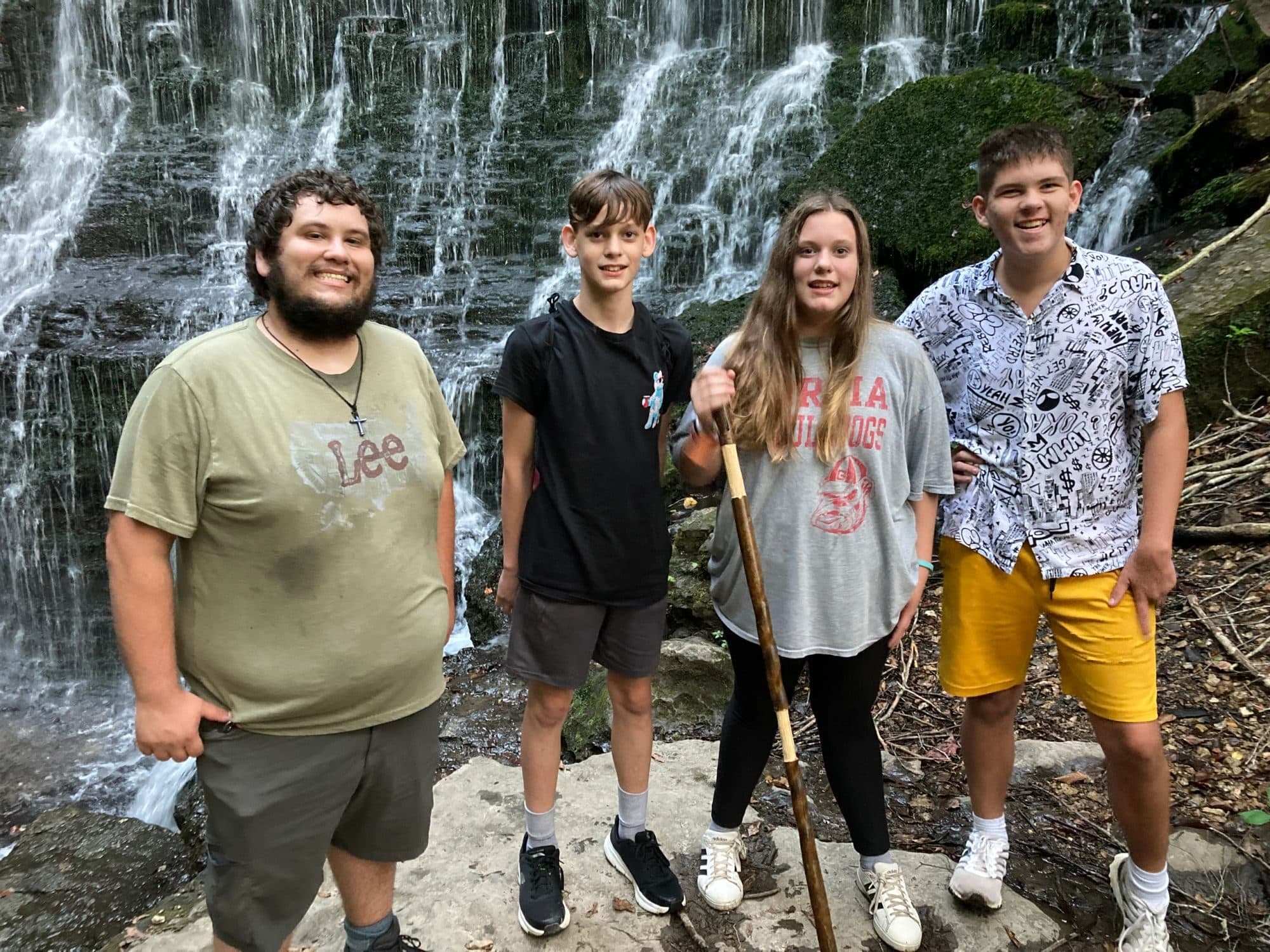 Bridges for Students group hiking together in front of Machine Falls near Tullahoma.